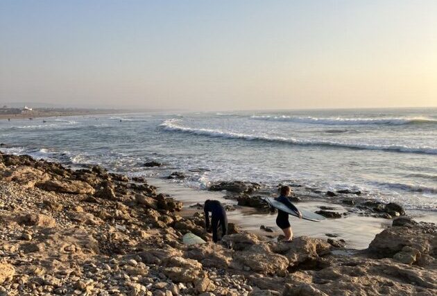 Surfing at Sidi Kaouki Beach, Morocco